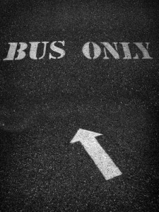 Bus Only Sign Painted on Roadway Asphalt for Direction