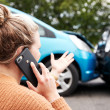 Female Motorist Involved In Car Accident Calling Insurance Company Or Recovery Service